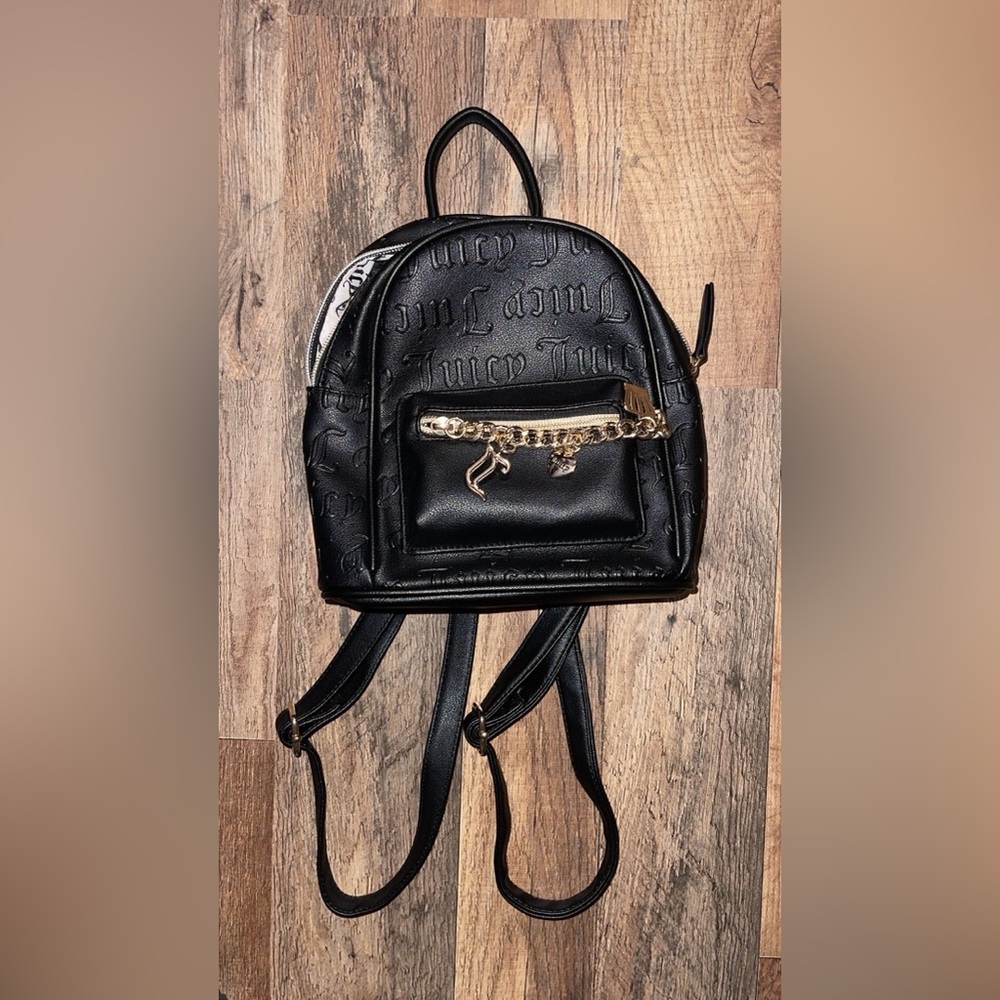 Juicy Couture Black and Gold Mini Backpack with Chic Design